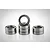 A set of eight metal shielded ball bearings arranged in three stacks against a white background.