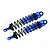 Two blue GPM Racing adjustable aluminium RC shock absorbers with black springs and shafts, isolated on a white background.