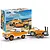 A Revell 1/25 scale 1965 Ford Bronco Half Cab model kit, featuring an orange Bronco towing a dune buggy on a trailer, with the product box in the background.