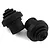 Two black rubber Traxxas Sledge driveshaft retainers shown against a white background.