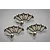 A collection of silver-coloured metal button head screws with hex drive sockets arranged in small groups on a reflective grey surface.
