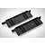Two black plastic RGT RC chassis baffle plates shown from an angled top-down perspective on a white background.