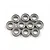 A set of ten small metal shielded ball bearings arranged in a cluster on a white background.