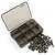 A set of titanium RC screws scattered next to an open, empty six-compartment plastic storage box on a white background.
