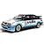 Scalextric 1/32 scale Ford Sierra RS500 slot car in Kaliber livery with number 22, featuring gold mesh wheels and detailed racing decals.