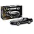 A Revell 1/16 scale 1987 Pontiac Firebird GTA plastic model kit box next to a fully assembled and painted black model car.