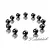 A set of twelve small, dark grey ceramic differential balls arranged in a circle on a reflective white surface with the XRAY logo in the corner.