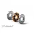An exploded view of an XRAY ceramic ball bearing showing the inner race with black ceramic balls and two outer metal shields on a white background.