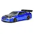 A studio shot of a blue Protoform 1/7 scale Nissan Skyline GT-R R34 RC car body shell with a carbon fiber look hood and rear wing.