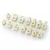A set of white nylon RC sway bar mounts and rod ends arranged on a white background.