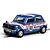 A 1/32 scale Scalextric Mini 1275GT slot car in blue and white Patrick Motorsport livery with number 60 on the side.