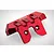 A red anodized aluminium rear bumper for an RC car by GPM Racing, featuring machined details and engraved text on a white background.