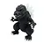 A stylized Chibi-Maru Godzilla plastic model figure standing on a white background.