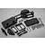 A Rovan dual steering servo tray kit including black plastic mounts, covers, two silver aluminium servo horns, and various screws and clips.