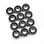 A collection of twelve identical metal ball bearings with black rubber seals arranged on a plain white background.