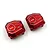Two red anodized aluminium differential covers for RC cars by Yeah Racing, featuring the YR logo and a machined design.