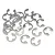A collection of small silver-coloured metal E-clips scattered on a white background.