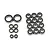 A collection of various sized rubber shielded ball bearings for RC cars arranged on a white background.