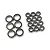 A collection of various sized rubber shielded ball bearings arranged in two groups on a white background.