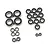 A collection of various sized rubber shielded ball bearings for RC cars arranged on a white background.