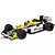 A 1/32 scale Scalextric Williams FW11 slot car in blue, yellow, and white livery with Canon and Mobil 1 branding, positioned on a slot car track.