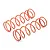 Two orange coil-over shock springs for an RC car, shown against a plain white background.
