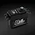 Power HD B4S brushless metal geared servo in black aluminium casing, viewed from a high angle against a dark textured background.