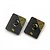 Two rectangular Yeah Racing 10g brass chassis balancing weights with black coating and central mounting holes.