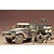 A 1/35 scale Tamiya model of a U.S. M21 Mortar Carrier half-track with three painted soldier figures operating a mortar in front of the vehicle.