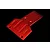 A red anodized aluminium front skid plate for an RC vehicle, featuring machined grooves and countersunk screw holes, isolated on a black background.