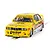 A 1/32 scale Scalextric BMW E30 M3 slot car in yellow Benson & Hedges racing livery on a track.