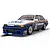 A Scalextric 1/32 scale Holden VL Commodore slot car in blue and white Rothmans racing livery on a white background.