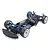 High-angle studio shot of a Tamiya TRF421 1/10 scale RC touring car chassis, featuring blue anodized aluminum parts, carbon fiber deck, and white wheels.
