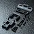 MST RRX conversion kit parts including molded plastic chassis components, screws, spacers, and washers arranged on a dark textured surface.