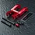 MST red aluminium integrated upper deck connector set with included screws, washers, and a small MST decal sheet on a textured black surface.