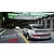 Digital illustration of a silver Porsche 911 Carrera RSR driving through a tunnel, used as box art for a Fujimi model kit.