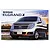Product box art for a Fujimi 1/24 scale Nissan Elgrand X plastic model kit, featuring a silver van against a sunset landscape background.