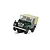 A Scalextric 1/32 scale Land Rover Series 1 slot car in dark green with a tan soft top, positioned on a slot car track.
