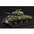 A weathered 1/56 scale plastic model of an M4 Sherman tank painted in olive drab with white star markings on a dark background.