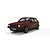 A red Scalextric 1/32 scale Volkswagen Golf GTI slot car viewed from the front three-quarter angle on a white background.