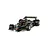 A 1/32 scale Scalextric Lotus 79 Formula 1 slot car in black and gold livery with number 5, sitting on a track section.