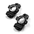 Two black anodized aluminium rear hub carriers for RC cars, shown from an angled top-down perspective on a white background.