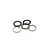 A small pile of five thin, circular stainless steel shims or washers isolated on a white background.