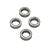 Four metal shielded ball bearings arranged in a diamond pattern against a white background.
