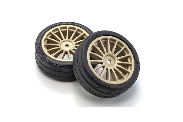 Semi-slick tyres and 15-spoke gold wheels
