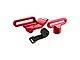 A set of red anodized aluminium RC battery mounts and a black velcro strap on a white background.