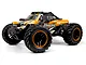 BlackZon Spryte MT RC monster truck in orange and black livery, featuring large off-road tires and a detailed body shell.