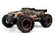 BlackZon Spryte ST 1/20 scale RC stadium truck in orange and black livery, featuring aggressive off-road tires and a rear spoiler.