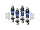 A set of four GPM Racing adjustable RC shock absorbers with blue and black aluminium components and silver springs, arranged on a white background.