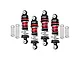 A set of four GPM Racing adjustable RC shock absorbers with red and black aluminium bodies and silver springs, plus four spare springs.